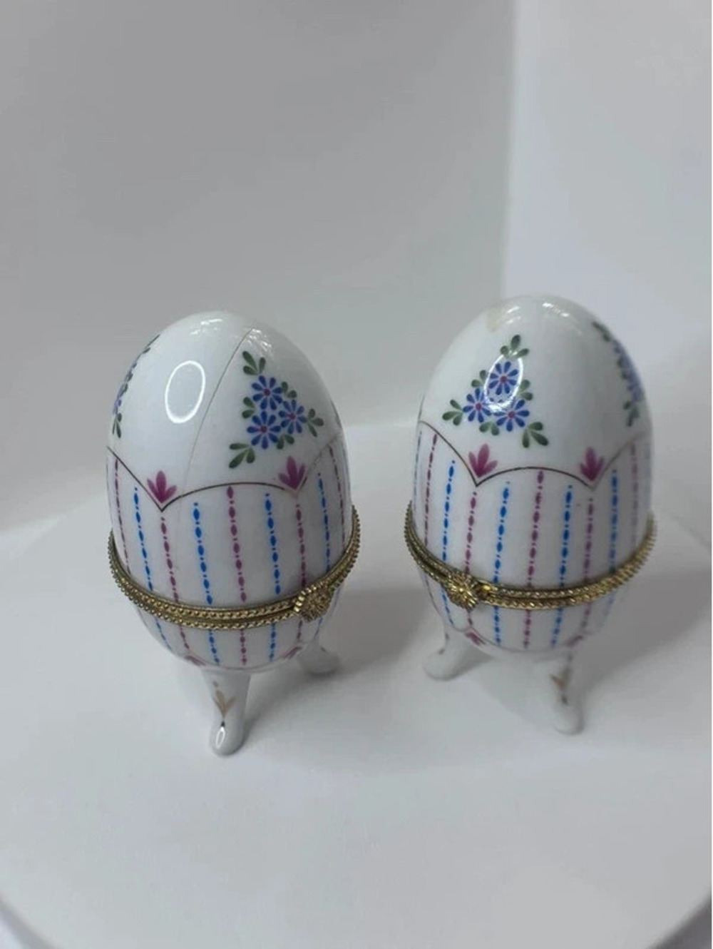 2 porcelain eggs. decorative , pretty flawed MAKE offer